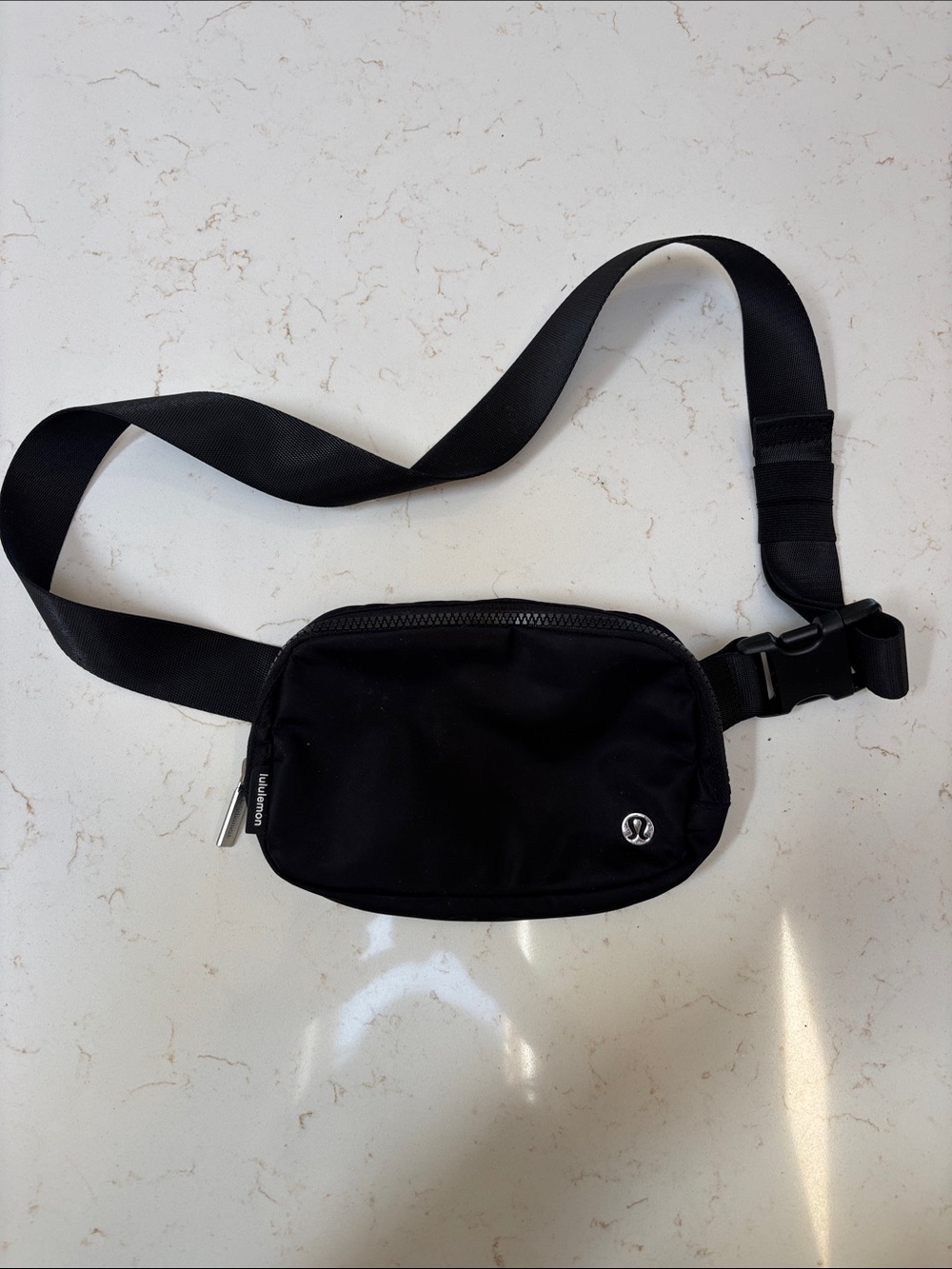 Lululemon black belt bag.